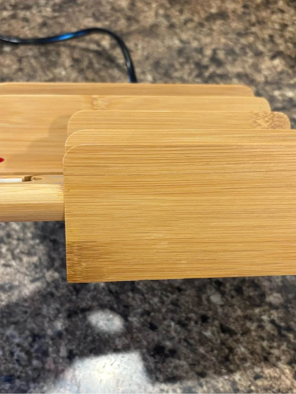 Bamboo organizer charging station with Apple Watch holder and 5 usb ports.